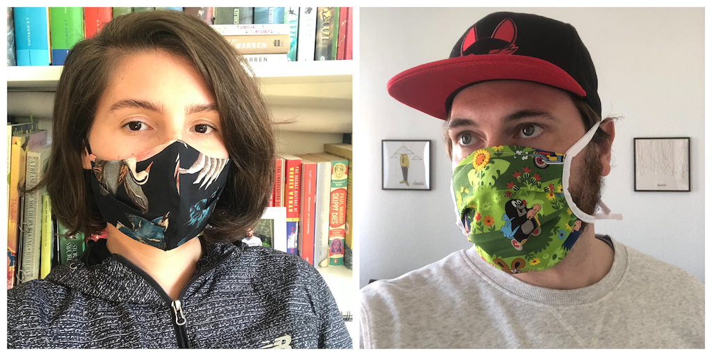 Woman and man wearing face masks