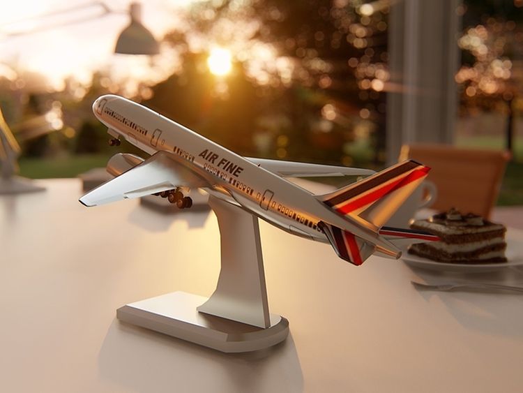  Model of passenger plane with sunset 
