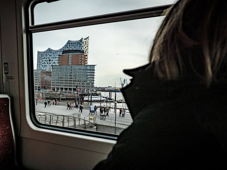  View of the Elbphilharmonie concert building from the window of a Hochbahn U-Bahn train car