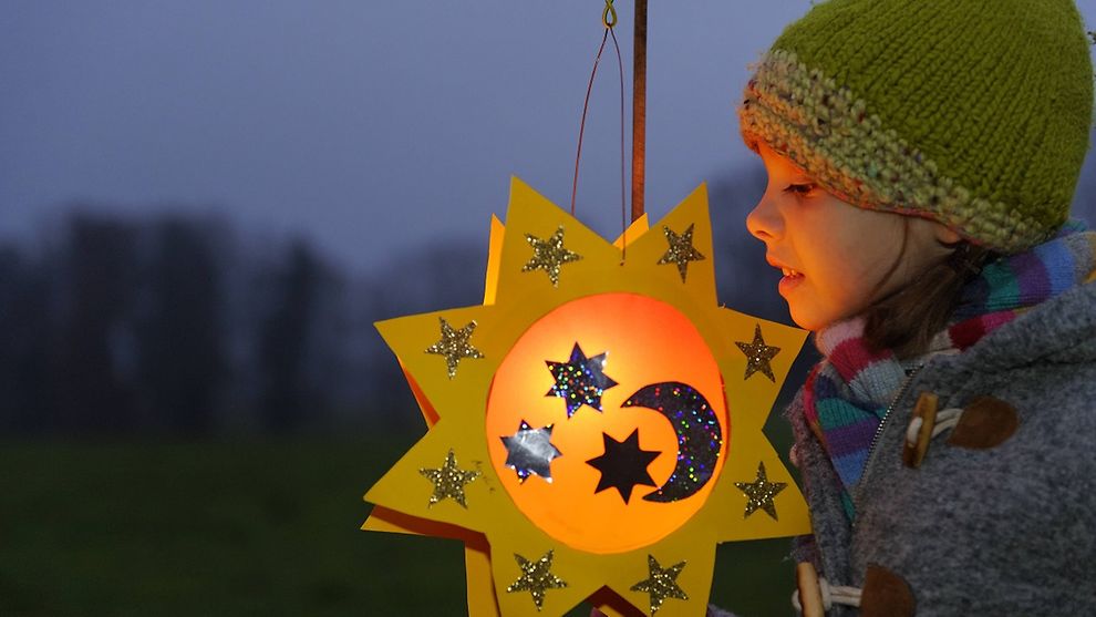 Child with ornated lantern